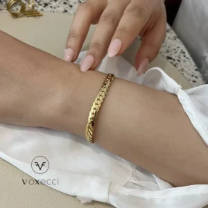 main image golden radco stainless steel bracelet displayed in a woman hand
